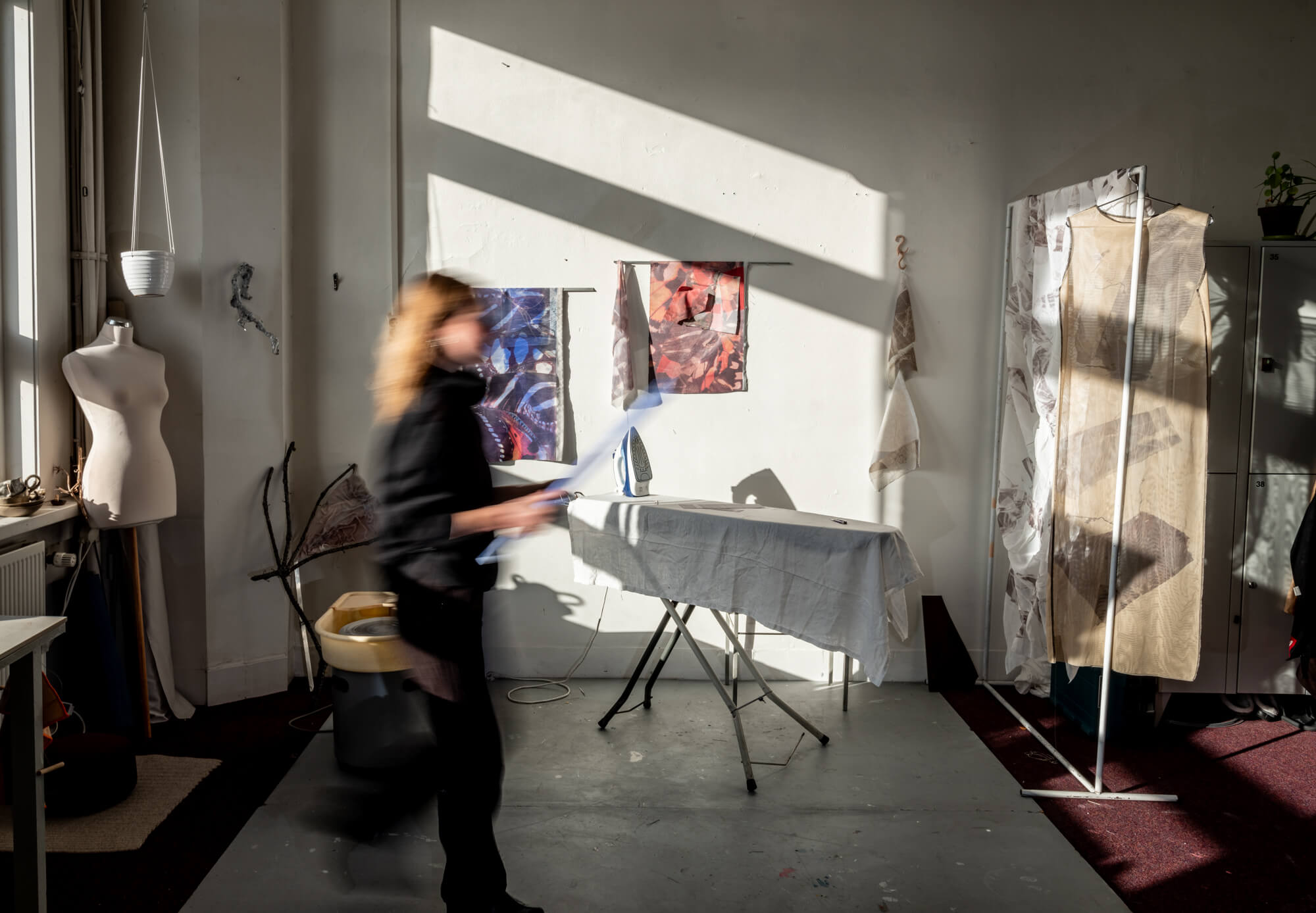 girl walking in art studio